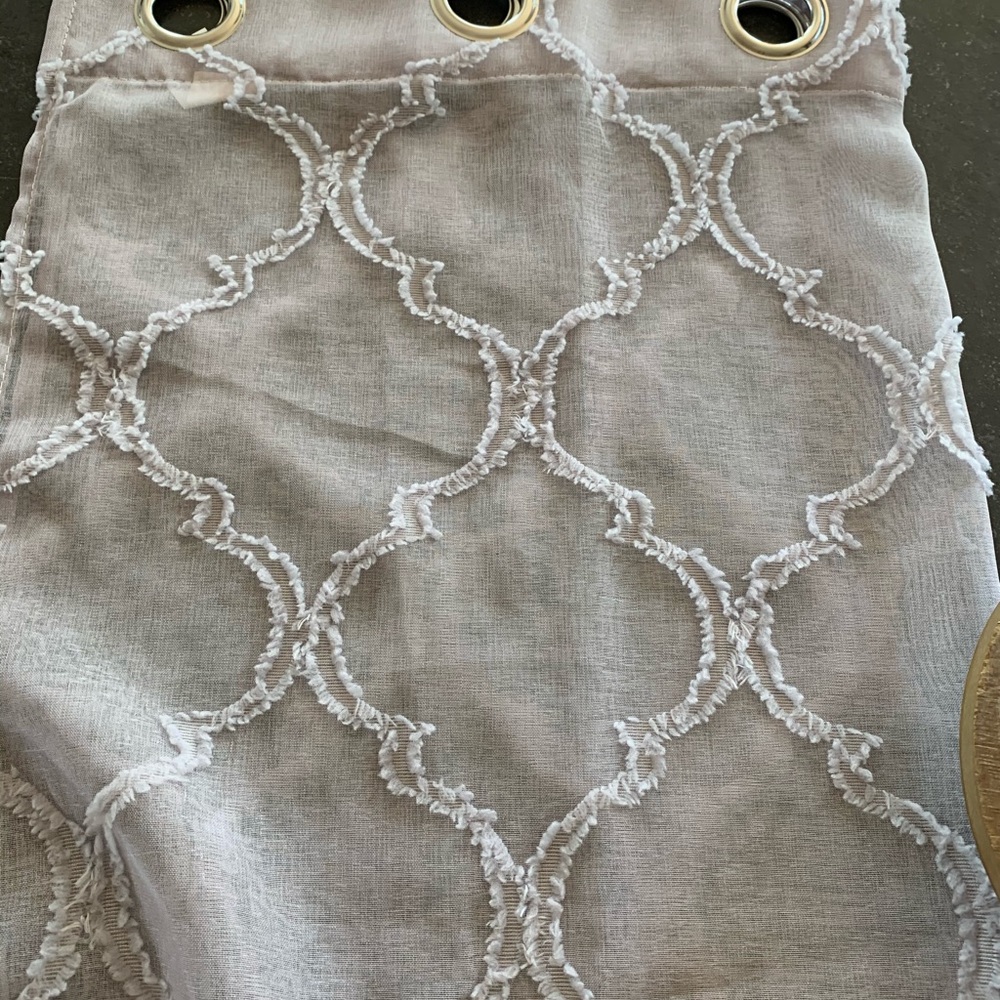 Four sheer lavender panels.